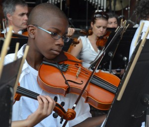 Chavez Singletary (above) of Mission Hill was among students from Brighton’s Conservatory Lab Charter School Dudamel Orchestra performing in concert with the Boston Landmarks Orchestra at the Hatch Shell downtown on July 24. Other Mission Hill students who performed in the concert included (not pictured) Kayleen Guzman, Anthony Vega, Brandon Volel and Nahshon Yisrael. (Courtesy Photo)