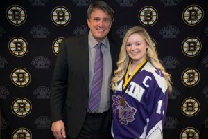Boston Latin School hockey player Jillian Lydon (right) meets Boston Bruins President Cam Neely during the March 17 Bruins game at the TD Garden, where she was honored among other winners of the Bruins/Massachusetts Interscholastic Athletic Association’s Ice Hockey Sportsmanship Awards. (Photo by Matt Hitchborn)