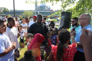 State Rep. Jeffrey Sánchez calls out raffle winners during the 11th annual Back to School Jam, which was held at the Mission Main housing development on Aug. 20. More than 200 people attended the event, hosted by Sánchez and MCPHS University. MCPHS University students and staff handed out school supplies, prizes and lunch from Anna’s Taqueria. More than 15 companies, colleges and organizations were also in attendance to provide health screenings and health information, including the Wentworth Institute of Technology, Whole Foods, Boston Children’s Hospital and New England College of Optometry. (Courtesy Photo)